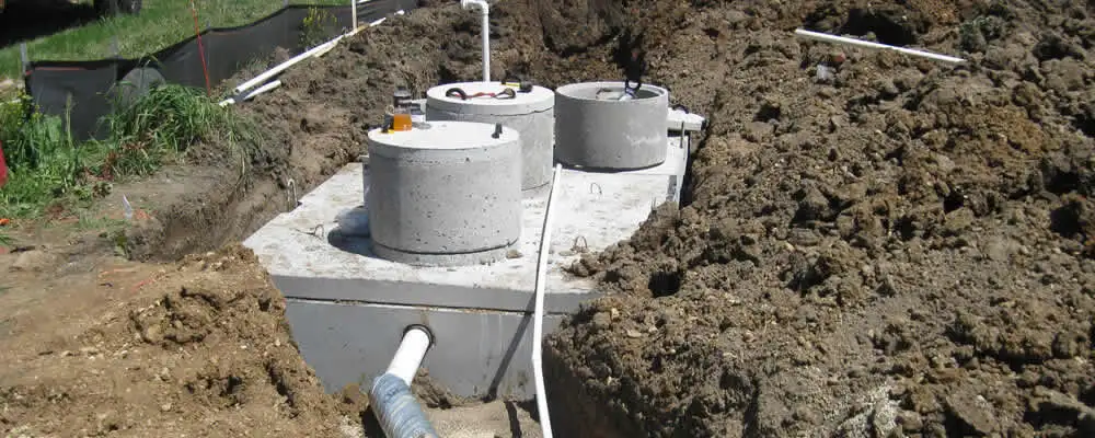 Septic system repair and installation site with tank access ports in Pasadena, CA