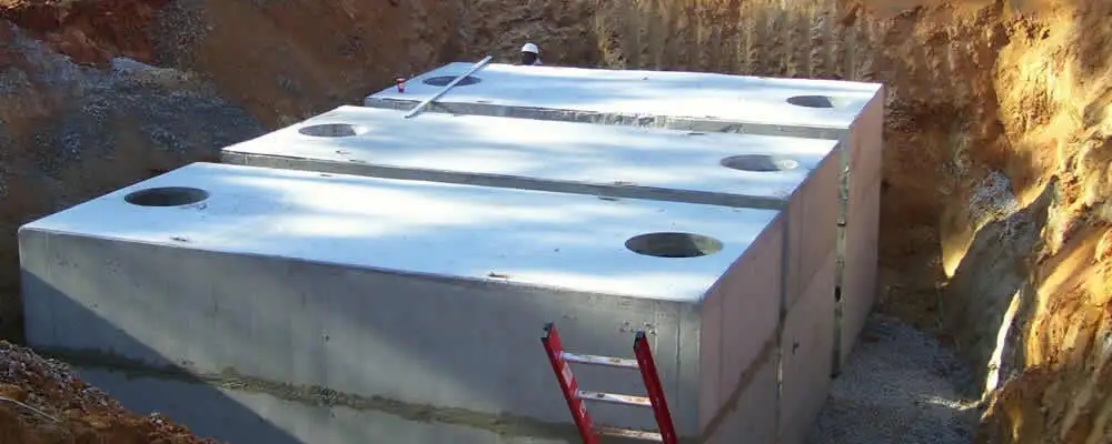 Septic tank installation site with a newly placed concrete tank in Pasadena, CA